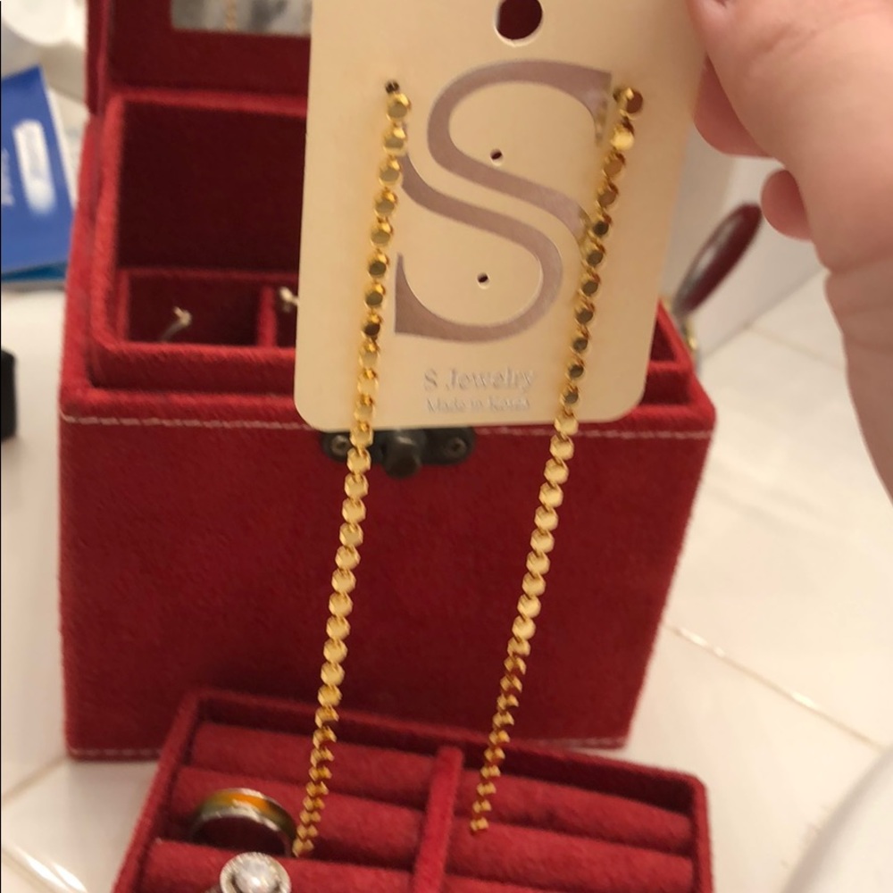 Extra long gold dangling sting earrings